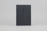 Czarne koperty z guzikami C5, Papierniczeni, design artykuły biurowe, domowe biuro