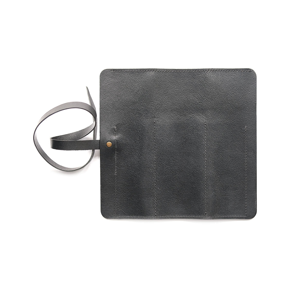 Skórzany piórnik rolowany – czarny, HUGBAG, papierniczy design