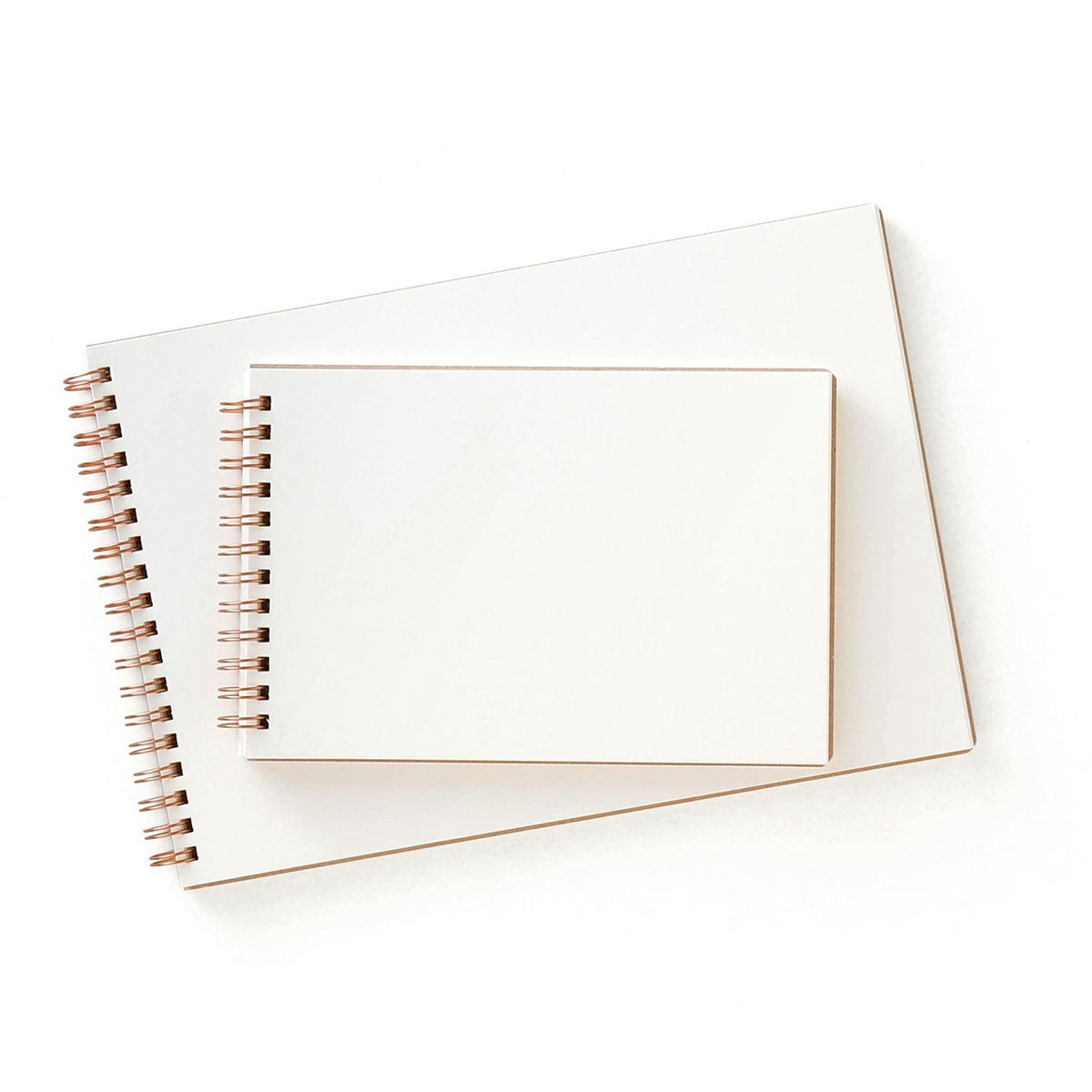 Kremowy środek szkicownika na spirali marki Penco.